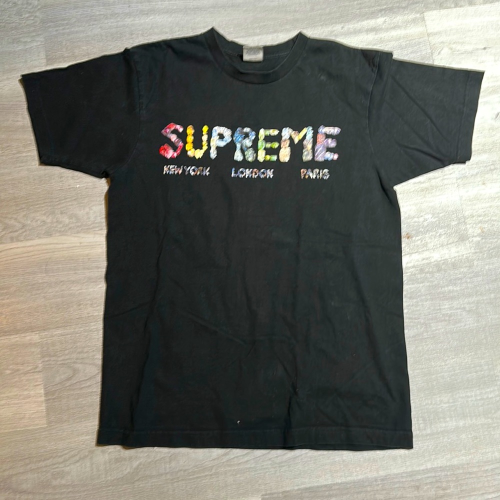 Used Supreme Tshirt side medium fits more like a small.